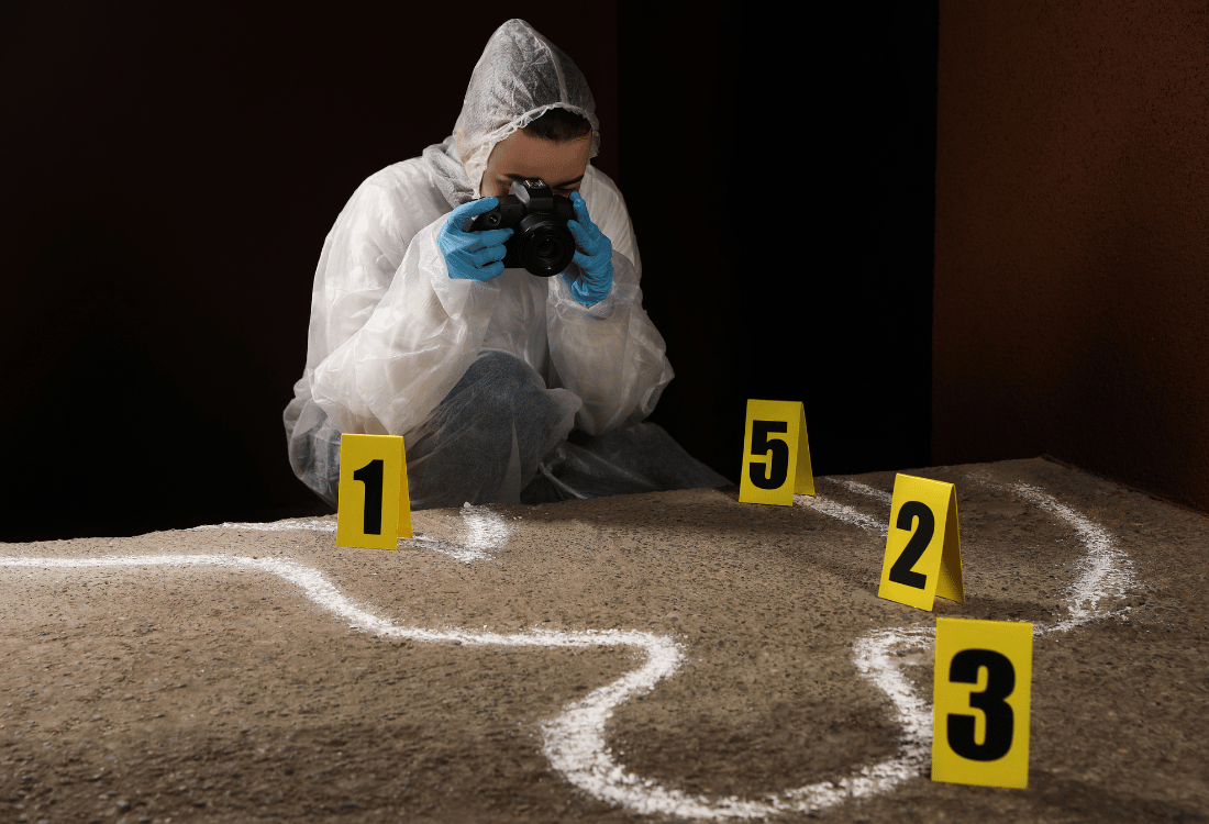 Forensic Scientist in a protective suit working at a crime scene showing why one body bag isn't enough for a crime scene.