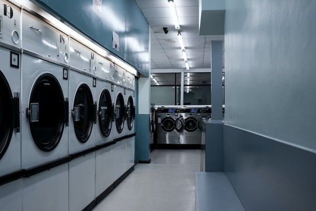 An image of a laundromat representing different types of water soluble laundry bags